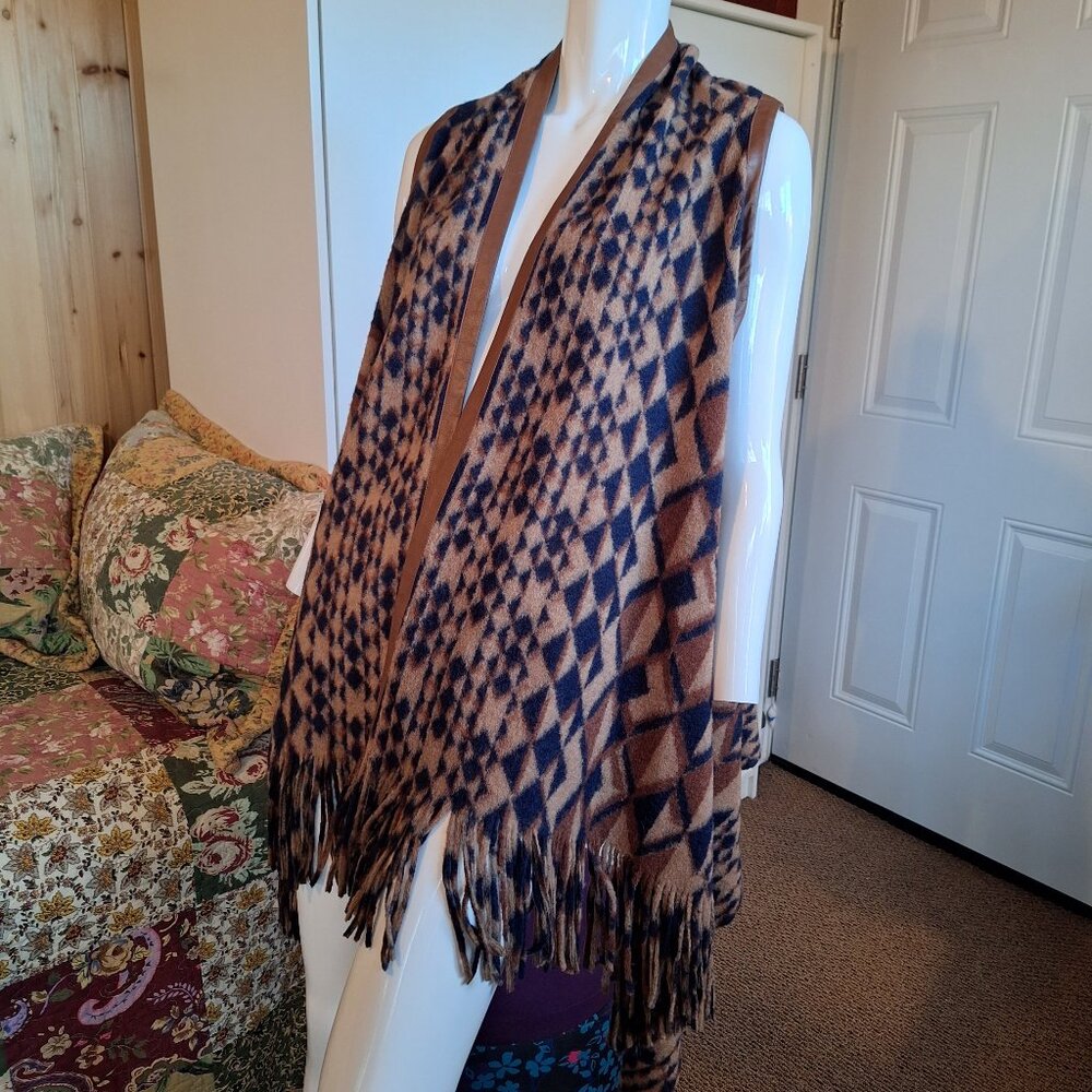 Long patterned, fringed vest/cardigan